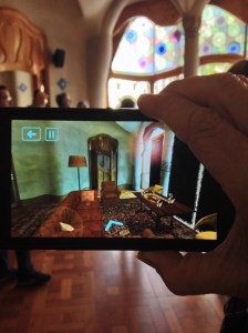 A view of what the room looked like when Gaudi designed it...through the Smartphone they use as a tour device